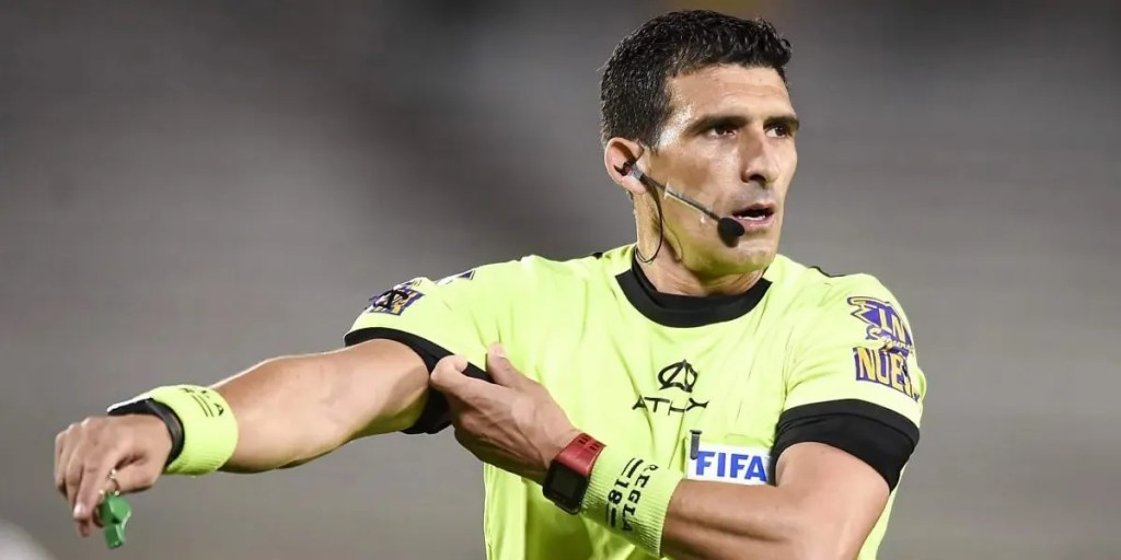 Andrés Merlos, Gustavo Gatti, Talleres, fútbol argentino, agresión, Copa Argentina, Fiscalía de Mendoza, AFA, Tribunal de Disciplina, Andrés Fassi, incidente en vestuarios, justicia mendocina, violencia en el deporte, imputación, audiencias, conflicto deportivo